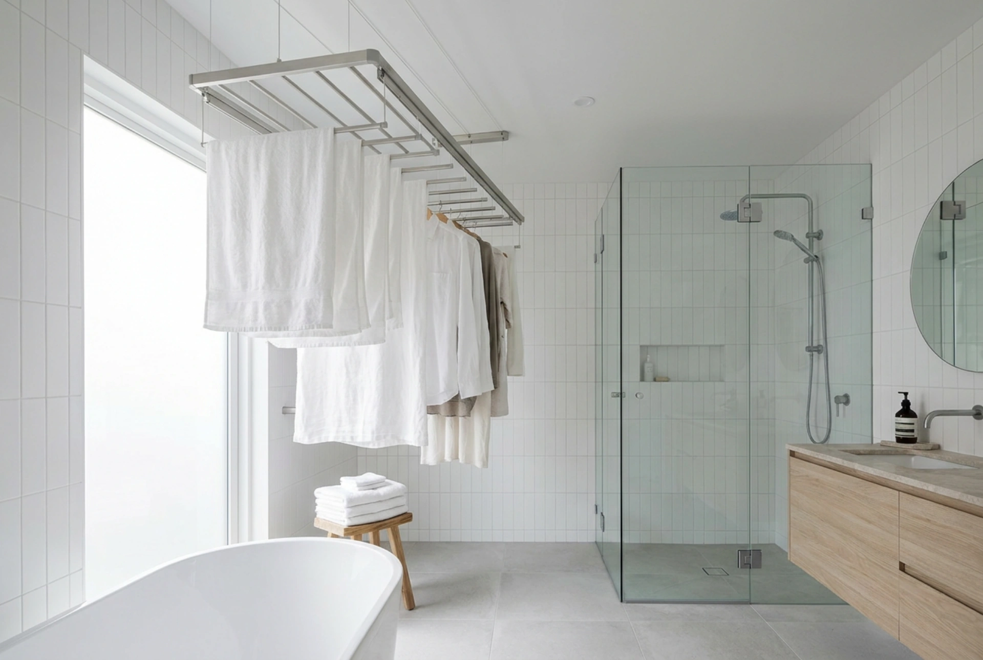 The Ceiling-Mounted Laundry Rack as a Practical Bathroom Solution
